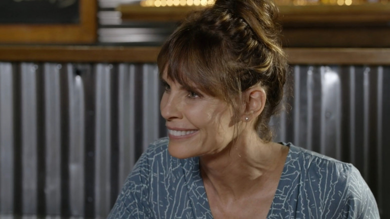 Abigail (Alexandra Paul) smiling in Baby Steps