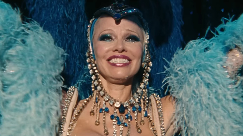 Shelly (Pamela Anderson) grinning with tears in her eye during show in The Last Showgirl