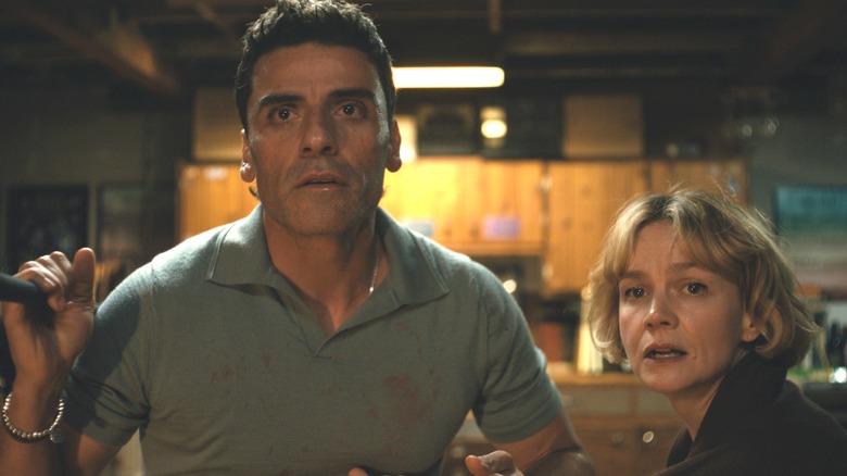 Oscar Isaac as Josh Martín and Carey Mulligan as Lindsay Crane-Martín caught in the middle of an argument at home in Beef