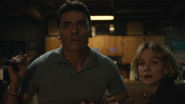 Oscar Isaac as Josh Martín and Carey Mulligan as Lindsay Crane-Martín caught in the middle of an argument at home in Beef