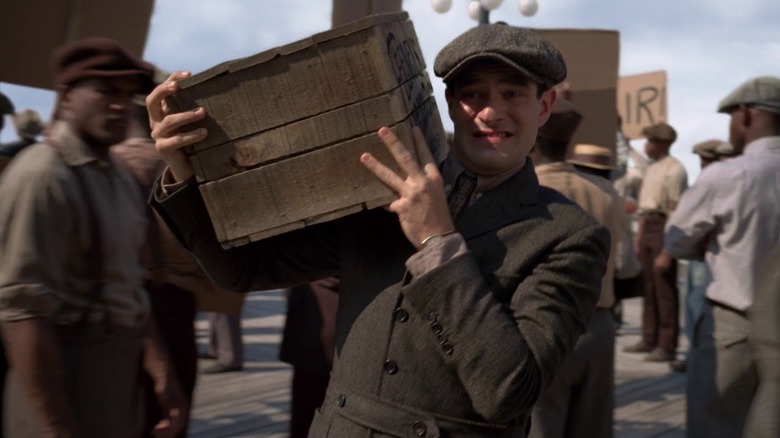 Owen Sleater carrying a crate on Boardwalk Empire