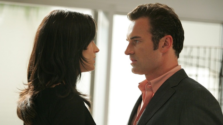 Famke Janssen as Ava and Julian McMahon as Christian on Nip/Tuck