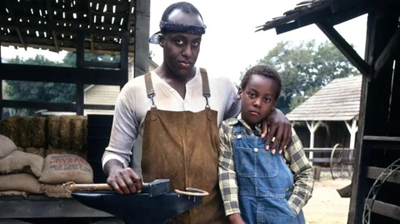 Luther (Bill Duke) and Booker (Jeremiah H. Johnson) in Palmerestown, USA