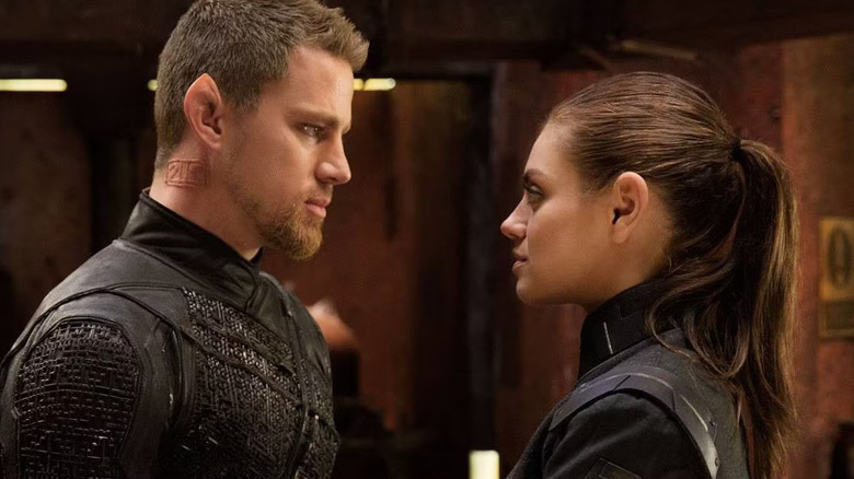 Caine and Jupiter looking at each other in Jupiter Ascending