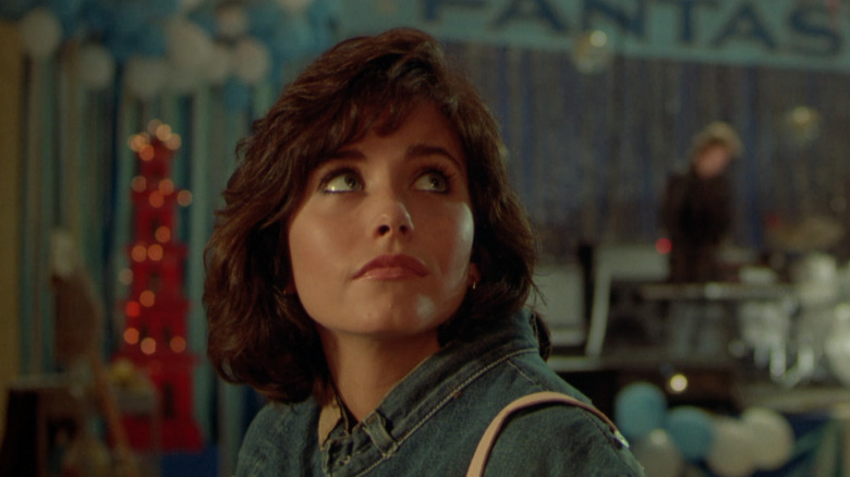 Courteney Cox as Julie Winston in Masters of the Universe