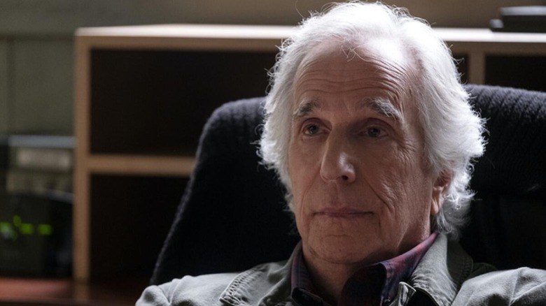 Henry Winkener as his cousin Jin appears serious in Barry