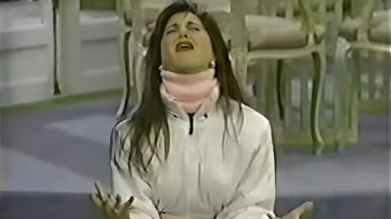 Courtney kneel on the floor on top 