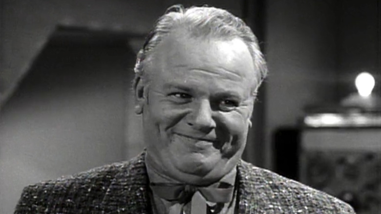 Alan Hale Jr.'s Omar M. Keck smiles as he stands opposite Ray Walston's Uncle Martin O'Hara in My Favorite Martian