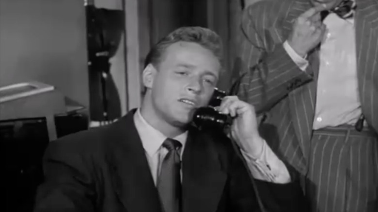 Russell Johnson's Chopper talks on a phone in Adventures of Superman