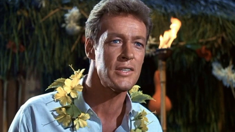 Russell Johnson's Professor Roy Hinkley is seen in closeup wearing a lei in Gilligan's Island