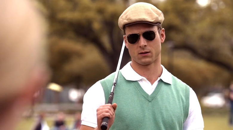 Scream Queens, Chad wearing sunglasses while golfing