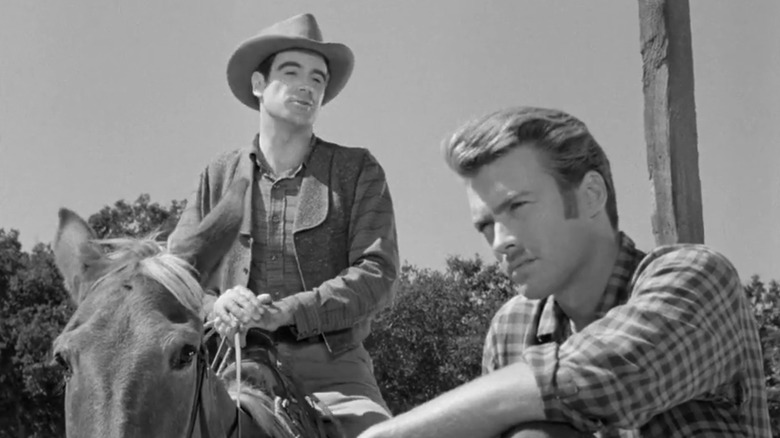 William Pullen's Alex Todd sits on a horse as Clint Eastwood's John Lucas sits sullenly on a porch in Death Valley Days