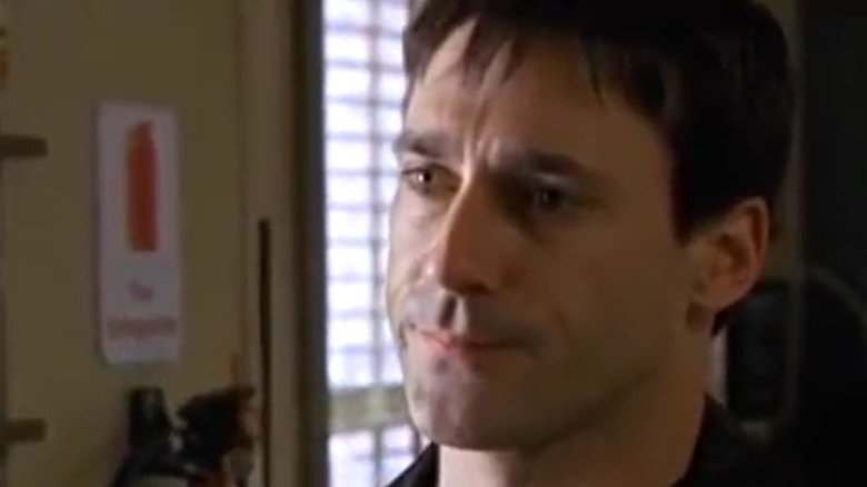 Jon Hamm as Nate Basso looking unimpressed in The Division