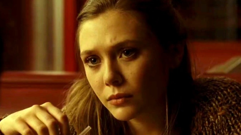 Elizabeth Olsen's Sally Owen is looking serious in Red Lights