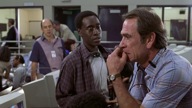 Emmit looking at a concerned Mike in Volcano