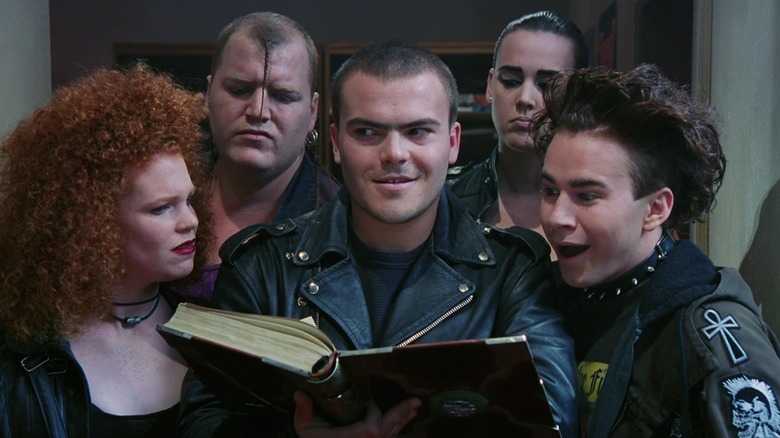 Slip and the Nasties holding a book in a hallway in The NeverEnding Story III: Escape from Fantasia
