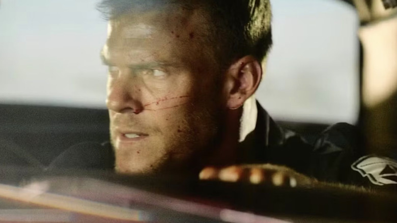 Alan Ritchson's Arthur Bailey is seen in closeup in Blood Drive