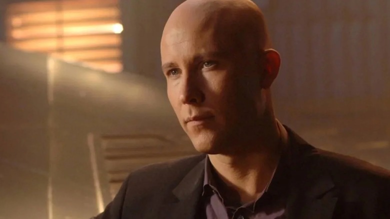 Smallville - close-up of Lex Luthor standing in Kent family barn
