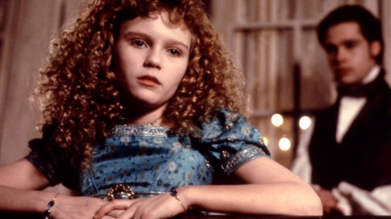 Claudia grows wistful while speaking to Louis in Interview with the Vampire