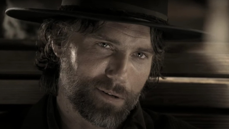 Anason Jabal as Colin Bouhanon with a cowboy hat and a beard on hell on wheels