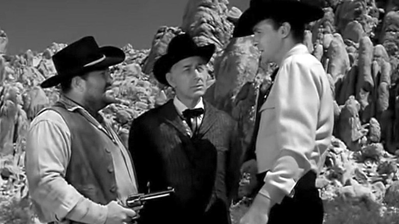 Three cowboys outdoors in Tombstone Territory
