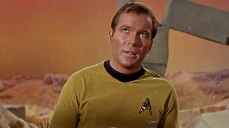William Shatner as Captain Kirk looking upward in Star Trek: The Original Series