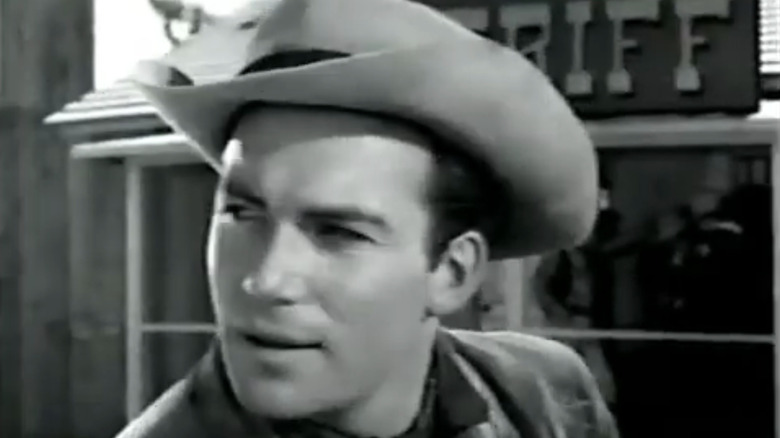 William Shatner as Wayne Gorham is seen in closeup in Outlaws