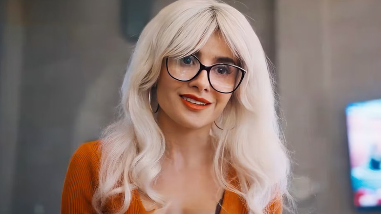 Cat Grant (Mikaela Hoover) talks to Lois Lane (Rachel Brosnahan) in "Superman"