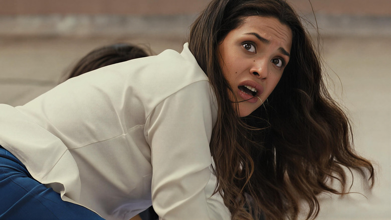 Leandra (Adria Arjona) crouched down in The Belko Experiment
