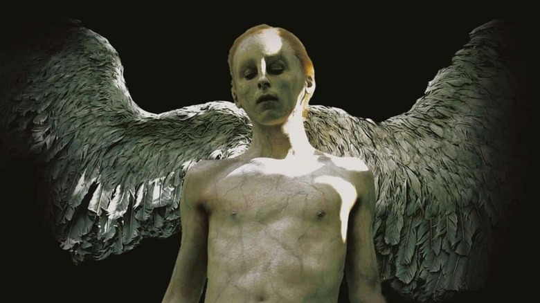 Christopher Redman as an angel -like creature in the Burns Cigarette ring from the Master of Horror
