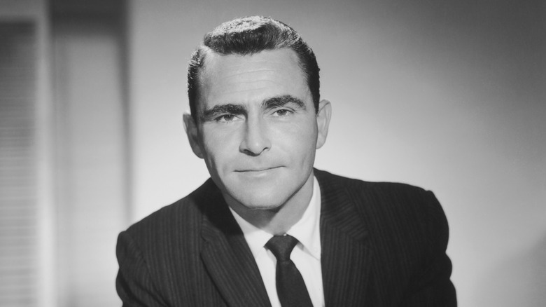Rod Serling wearing suit and tie