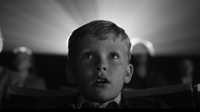 young boy in movie theater