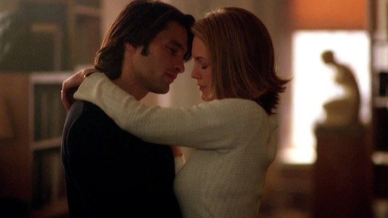 Man and woman embrace