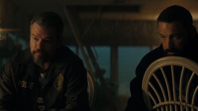Ben Affleck in the role of Sergeant GD Bern and Damedon in Lieutenant Dan Dumarz sitting on chairs next to each other in Rip