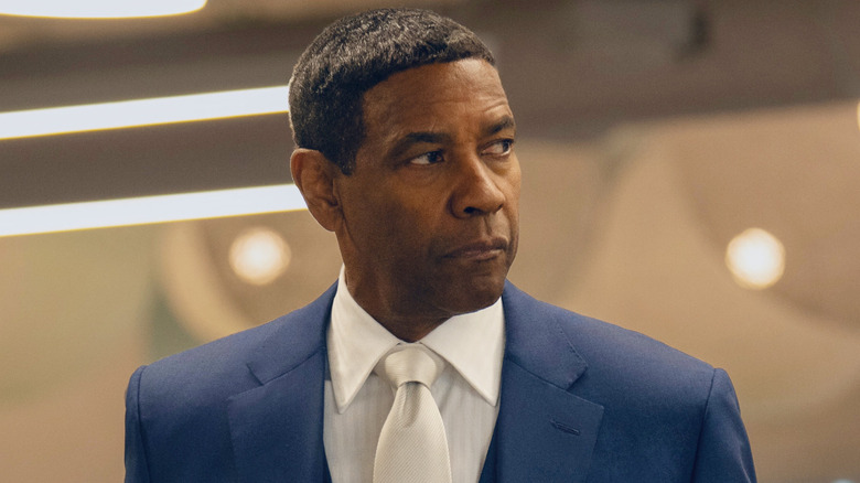 David King wearing a blue suit in Highest 2 Lowest
