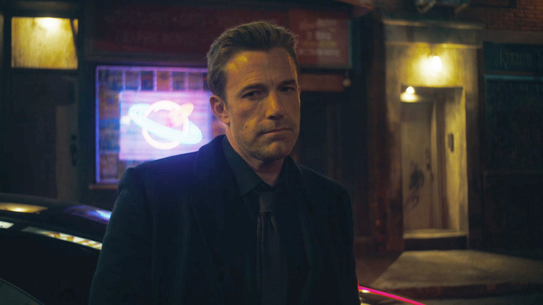 Ben Affleck's Bruce Wayne stands in an alley in The Flash
