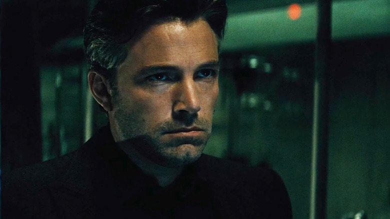 Ben Affleck's Bruce Wayne looks across frame in Batman v Superman Dawn of Justice.jpg