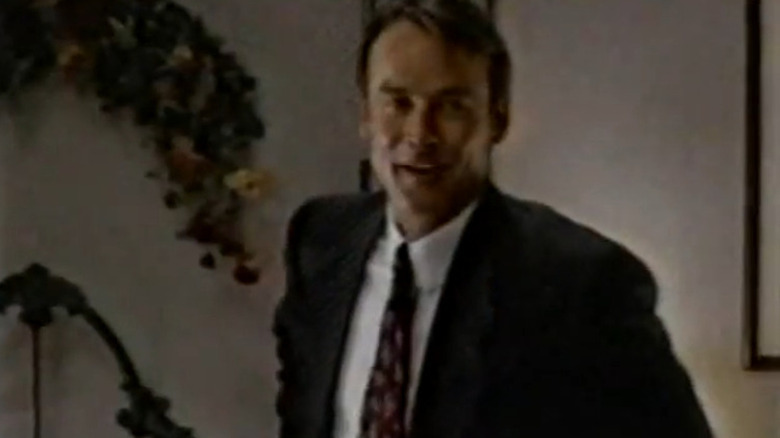 Ed Clemons in a suit in Against the Grain