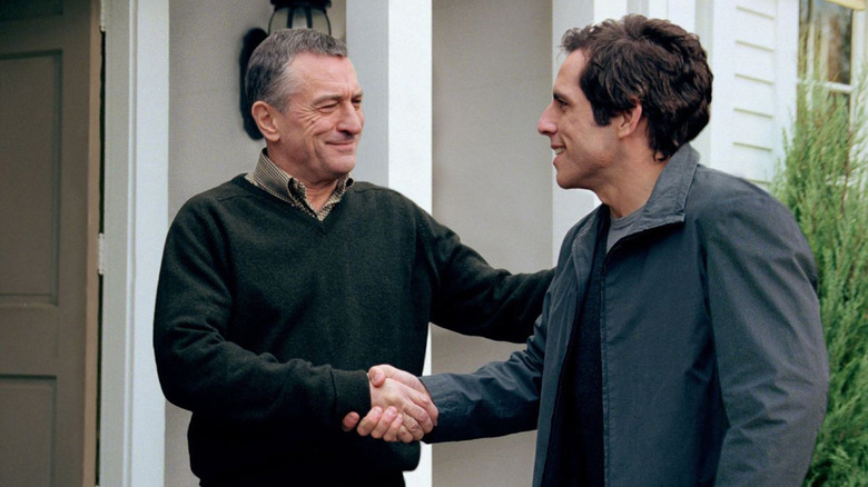 Robert De Niro as Jack shaking hands with Ben Stiller as Greg in Meet the Parents