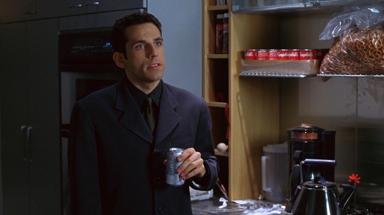 Ben Stiller drinks a soda as Steve Arlo in Zero Effect