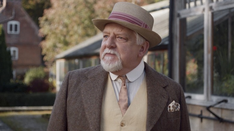 russell beale standing concerned
