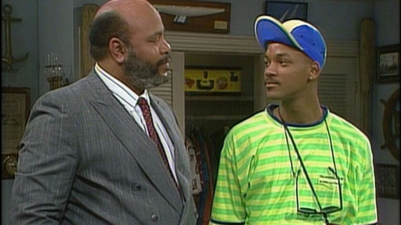 Phil Banks (Avery Brooks) and Will Smith glance approvingly at each other in The Fresh Prince of Bel-Air