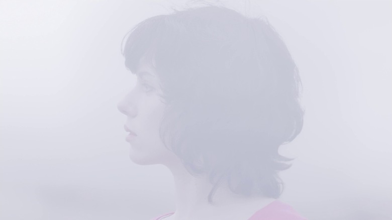 A faded image of Scarlett Johansson as the woman in Under the Skin, looking to the left