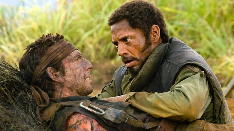 Robert Downey Jr. as Kirk Lazarus gives an in-character pep talk to Ben Stiller's Tugg Speedman