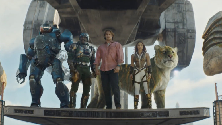 Masters of the Universe (2026) - Roboto, Duncan, Adam, Teela, and Cringer standing together on landing deck of aircraft