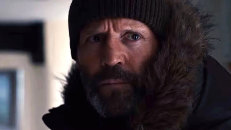 Michael Mason (Jason Statham) standing in a hallway in "Shelter."