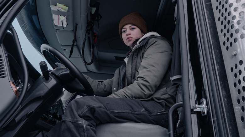 Midthunder behind wheel of truck