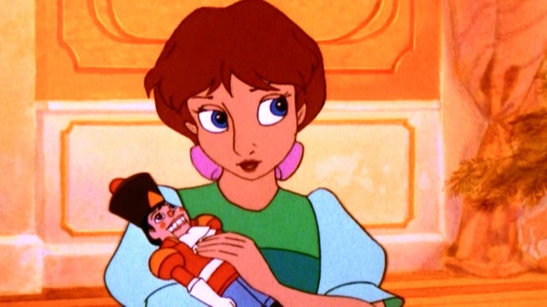The Nutcracker Prince's Clara holding nutcracker