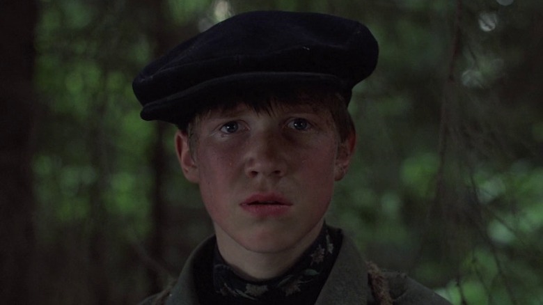 Aleksei Kravchenko as Flyora looking surprised in Come and See