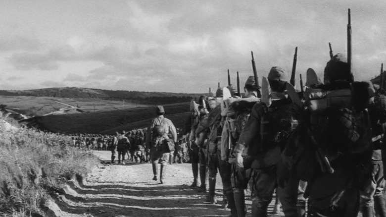 Soldiers marching down road in The Human Condition, Part II: Road to Eternity
